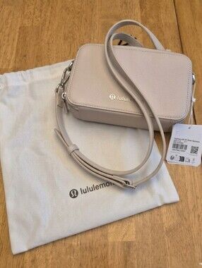 Lululemon Cactus Leather Cashew Ivory & silver camera crossbody bag $128 Retail